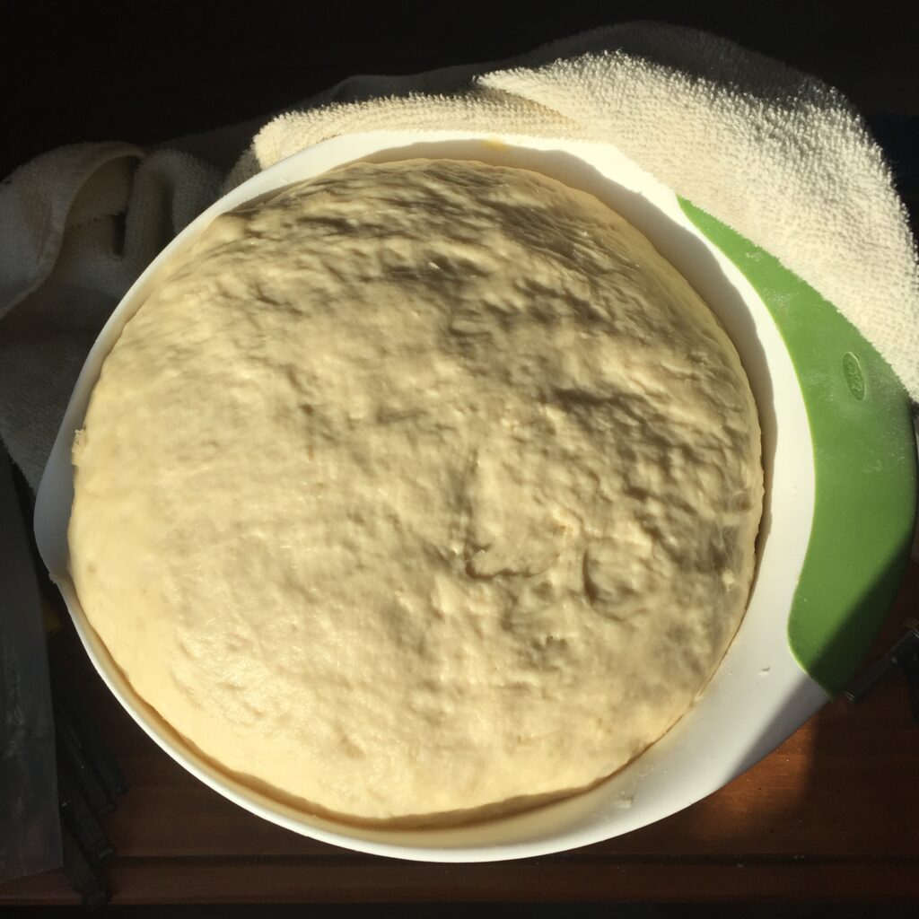 Photo of dough rising in warm location before being punched down and made into Grandma’s Rolls. Photo taken by author.